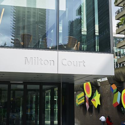 glass sided office building with name Milton Court